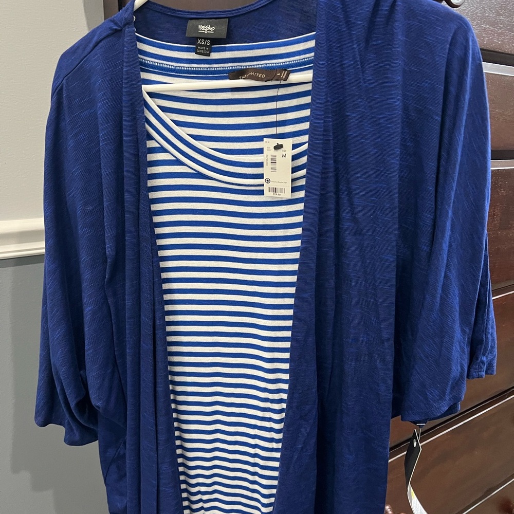 Great work attire. Royal blue short sleeve stripped shirt w/royal blue sweater.